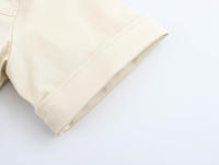YENKYE 2025 Vestido corto Beige con vuelo para mujer, bolsillos frontales con parches, cuello de solapa, corte en A, Vestidos de verano informales para oficina - details 8
