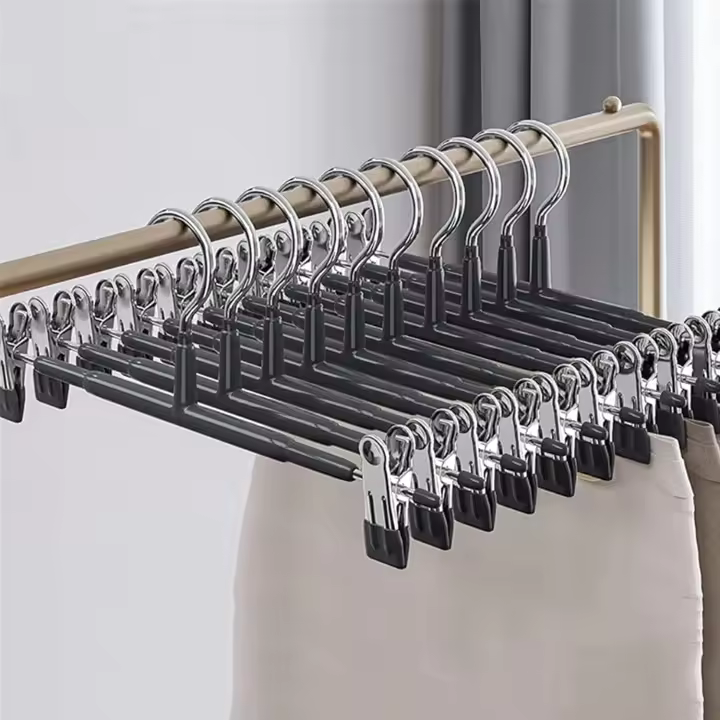 Paquete de 10 perchas para pantalones de 30 cm, ahorradoras de espacio, con clips ajustables. - 1