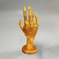 Figura de mano mecánica en resina , soporte para mandos de juego - details 9
