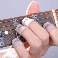 15Pcs Guantes De Silicona Para Dedos Antideslizantes Y Anti-Quemaduras Para Jugar Al Piano Leer Libros Y Bordar Transpirables Y Con Agujeros Para Mayor Comodidad - details 0