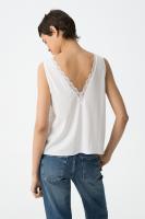 Top Cosmo Blanco Tiffosi. El Top Cosmo Blanco de Tiffosi combina elegancia y sencillez en una prenda sin mangas de jersey. - details 2