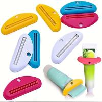 4pcs/pack Sujetadores De Tubo De Pasta De Dientes Plásticos En 4 Colores Utensilio De Higiene Oral Para Viajes - details 1