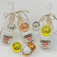 Regalos para invitadas de Boda Comuniones bautizos aniversarios cumpleaños 10/15 UNIDADES bálsamo de labios con aroma a vainilla y tarrito de Nutella con cuchara presentado en bolsa de regalo con cordon en color champan - details 0
