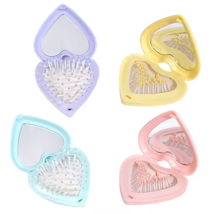 cepillos de viaje para el cabello, mini cepillo con espejo, plegables para mujeres y niñas, colores aleatorios. - 1