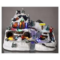 XOCOTŌ® Pueblo de navidad "Chefchaouen"  Escena navideña luminosa con niños jugando delante de la casa de Papá-Noel  37.5x21.5x25.5 cm - details 1