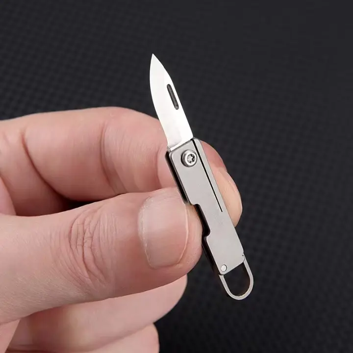 Nueva Cuchillo De Bolsillo Plegable De Aleación De Titanio Miniatura Portátil Llavero Colgante Desempaquetado Y Desempaque Cuchillo De Mensajería - 1