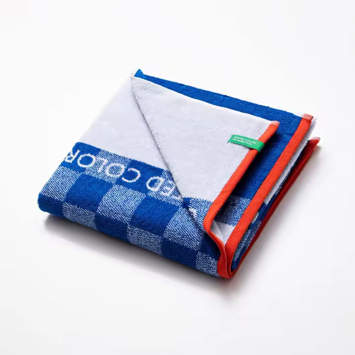 Toalla de playa 140x70cm cuadros azules kids benetton - 1