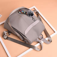 Mochila Impermeable Para Mujer Estilo De Moda Oxford Con Borla Y Pelota De Pelo Gran Capacidad Para Viajes Y Escuela - details 8