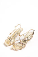 Sandalias doradas tacón fino con tiras cruzadas y hebillas de diseño moderno para mujer ideales para fiestas Paloma Wang - details 2