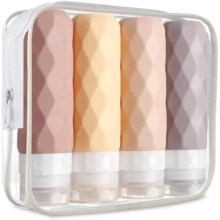 Botellas de silicona para artículos de aseo de viaje con bolsa transparente - Paquete de 4 - Botellas rellenables para champú y acondicionador - Accesorios de viaje herméticos y apretables (rosa) - 1