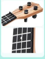 Ukelele De 35cm Para Niños Guitarra De Juguete Que Se Puede Usar Para Instrumentos Básicos Con Palillos Simulando Música De Guitarra - details 6