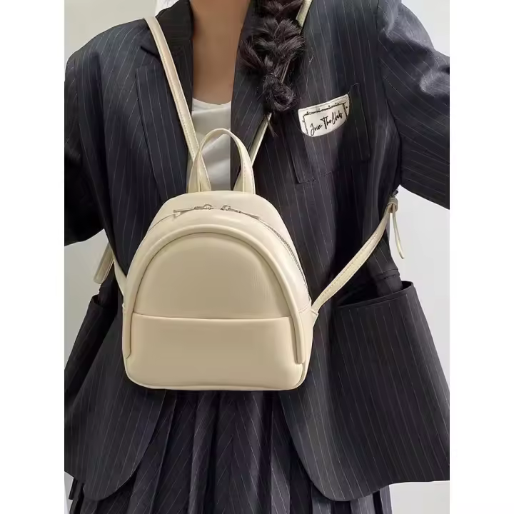 Mochila pequeña ligera de alta gama 2024 nueva primavera y verano retro simple versátil mochila pequeña para estudiantes - 1