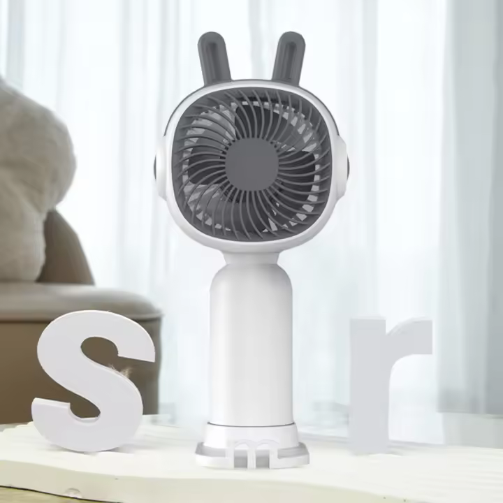 Pequeño Ventilador Mano con Orejas de Conejo Cute - Portátil y Cute / Aplicable a Múltiples Escenarios - 1