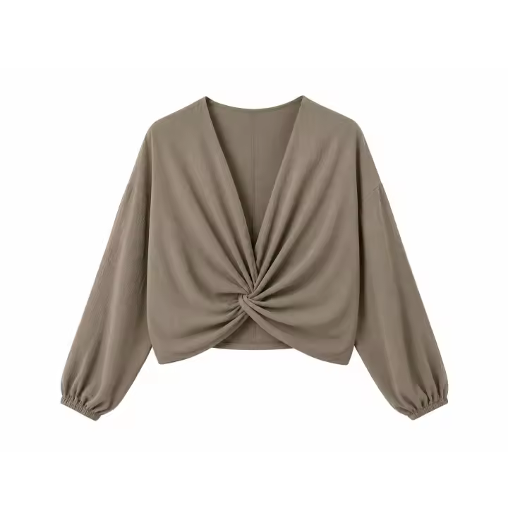 Blusa elegante y moderna para mujer con silueta estilizada gracias al detalle cruzado y escote en V, manga larga abullonada con puños elásticos, tejido suave y ligero ideal para looks casuales y formales - 1