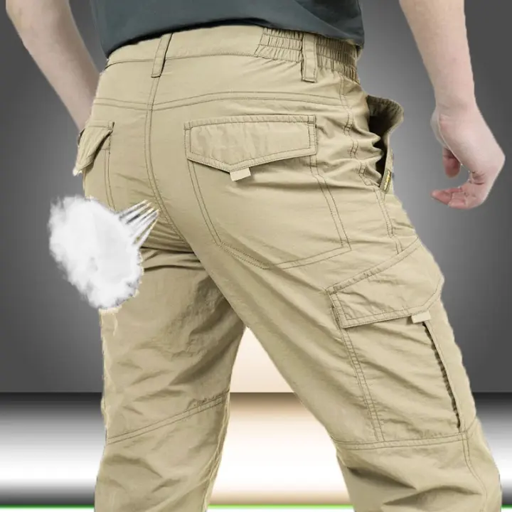 Pantalones Largos Casuales de Verano para Hombres Militares y Tácticos Impermeables with Secado rápido Material Exterior T105 y Forro de Poliéster Talla Regular - 1