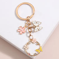 Llavero De Enamel Lindo Con Mariposa Y Flor De Sakura Llavero De Jardín Para Amigas Y Mujeres Regalo De Amistad Joyería Hecha a Mano - details 2