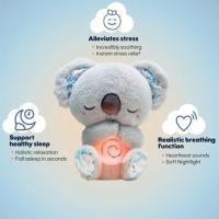 Koala relajante de Plush portáil, nutria que dierme, breathes y Alivia La Ansiedadcon Luz musical y Chupete. - details 1