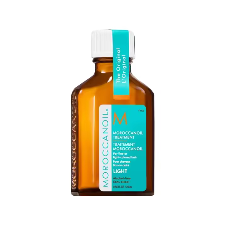 Moroccanoil Tratamiento Light 25 Ml. Aceite capilar multitarea con infusión de aceite de argán para suavizar el encrespamiento, desenredar, acondicionar y potenciar el brillo. Específicamente formulado para cabello teñido en tonos claros y cabellos finos. - 1