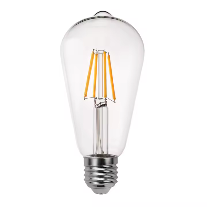 Bombilla pebetero decorativa de la serie FILAMEN de cristal con terminación TRANSPARENTE. Casquillo E27. Se caracteriza por tener 8W de potencia, 850 lúmenes y 2700ºk de color de luz cálida. Tiene unas dimensiones de 14x6,5x6,5 cm. De estilo retro vintage - 1