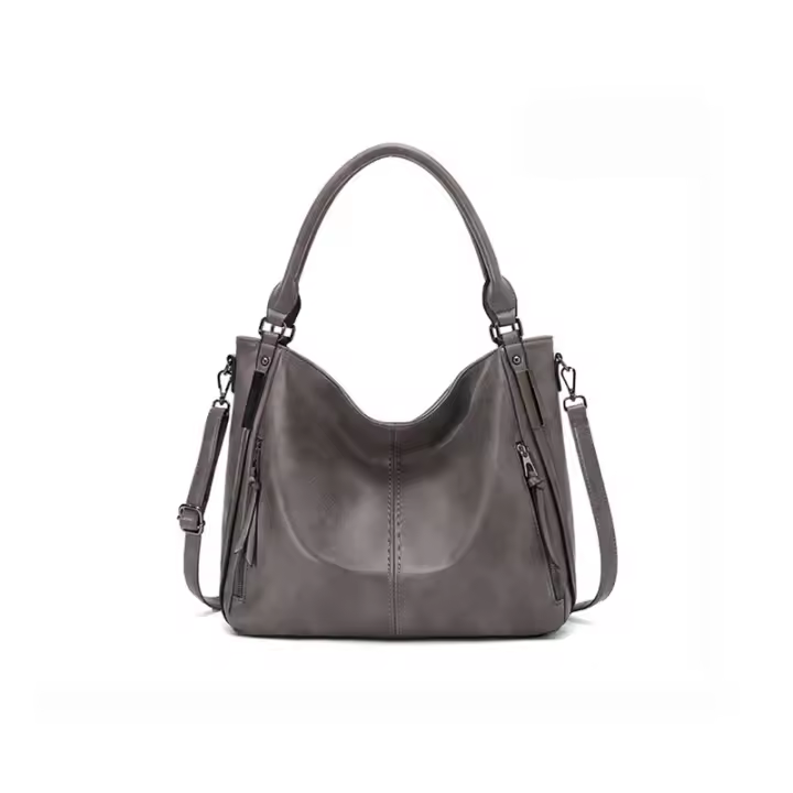 Bolso hobo CAIA, de look sencillo - 1