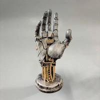 Figura de mano mecánica en resina , soporte para mandos de juego - details 4