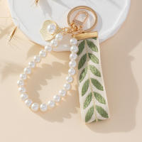 1Pc Encantador Lanyard De Teléfono Con Perla Artificial Y Hoja Charm De Bolso Accesorios Para Mujer Uso Diario Regalos - details 6