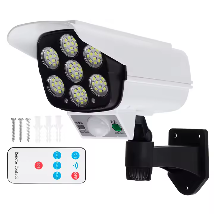 Lámpara solar de pared LED exterior con sensor de movimiento | Foco Solar de Vigilancia con Forma de Cámara de Seguridad | Foco LED regulable con mando a distancia | IP65 Resistente | RevolutionLine - 1