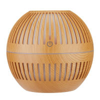 Nueva y creativa máquina de aromaterapia de aceite esencial de grano de madera hueco de estilo retro redondo creativo mini humidificador USB para el hogar, grano de madera claro - details 0