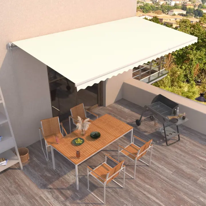 vidaXL Toldo retráctil manual crema 600x350 cm - 1