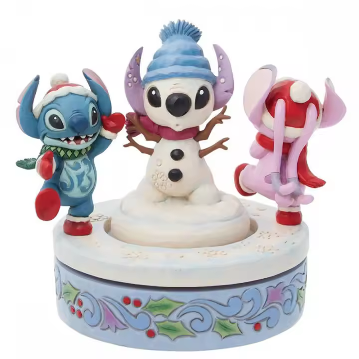 Figura decorativa enesco disney stitch y angel con muñeco de nieve rotativo - 1