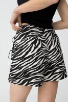 Falda pantalón Pipa de Tiffosi. Falda con total print de cebra, con cordones ajustable en los laterales y cremallera - details 1
