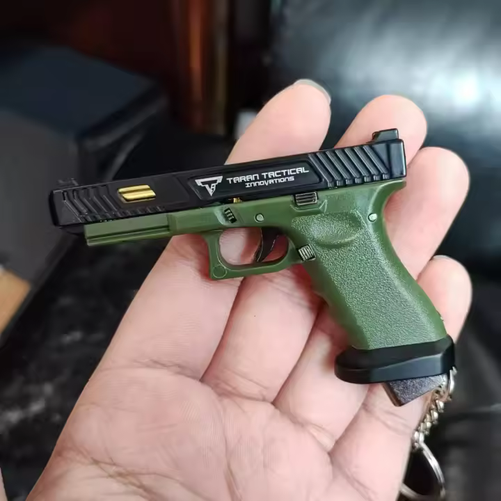 Pistola De Juguete Miniatura TTI G34 En Aleación Para Coleccionistas Y Regalos Para Niños Y Adultos Sin Batería Material Metálico - 1