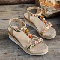 Perfect for the beach, these casual, bohemian-inspired women's wedge sandals feature hand-woven multicolor elastic and an open toe. - details 2
