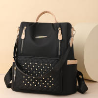 Mochila escolar para estudiantes con forma de diamante de gran capacidad, moderna, sencilla, informal y versátil, mochila para mujer con incrustaciones de remaches. - details 4