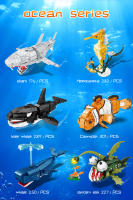 Bloques De Construcción Animal Del Mundo De La Playa Set De Modelos De Ballena Delfín Jirafa Y Oveja Para Niños Educativo DIY Juguetes Regalos De Vacaciones - details 1