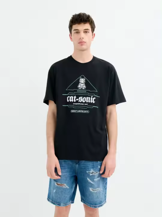 Camiseta oversized de algodón con estampado cyberpunk de gato robótico, ideal para un look urbano INSIDE - 1