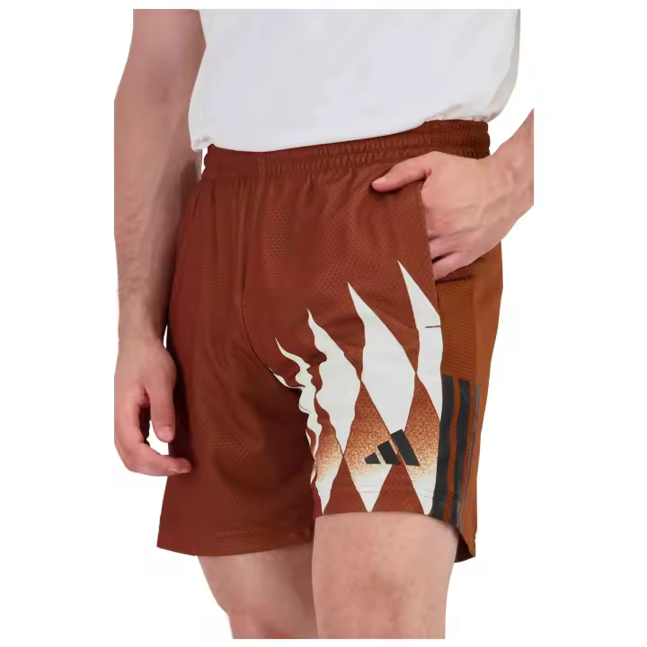 Pantalon Corto Adidas modelo House Of Tiro X Common Goal Pique Shorts para hombre y mujer en color Marron - 1