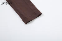 Conjunto Elegante Para Mujer Nibber 2 Piezas Suéter De Manga Larga Con Cuello Redondo Y Falda Acolchada Con Borlas Moda Urbanita - details 6