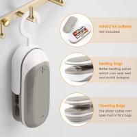 Mini sellador de bolsas, 2 en 1 sellador de calor y cortador, máquina de sellado de bolsas de chip portátil para la conservación de aperitivos y almacenamiento de alimentos - details 0