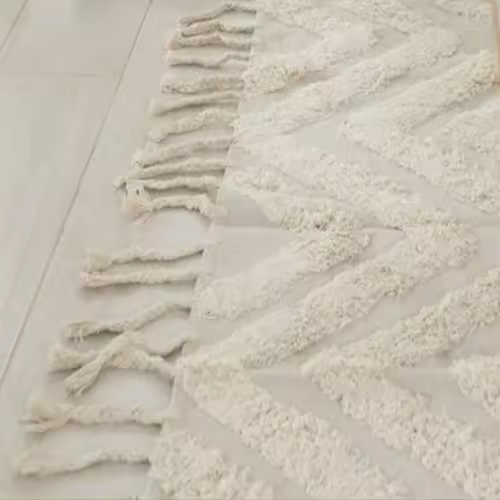 Alfombra Hindi 180x280 cm de algodón con diseño de rombos y flecos para salón o dormitorio de la marca Origen - 1