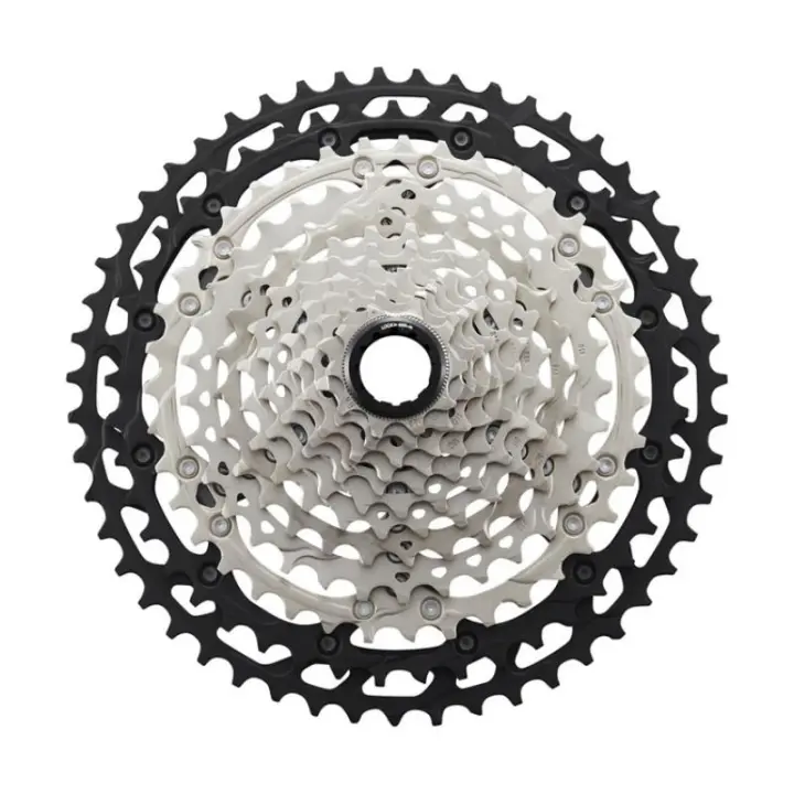 SHIMANO | Cassette Deore XT M8100 12v - DEORE XT – Durabilidad y rendimiento para los ciclistas de montaña de hoyLa nueva serie DEORE XT M8100 incluye características innovadoras como el cassette de - 1