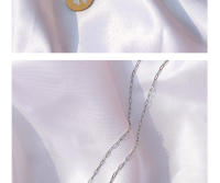 Encanto Collar con colgante de flor de cuatro hojas estilo INS europeo y americano, diseño ovalado de concha blanca, cadena de clavícula chapada en oro de 18 quilates y acero de titanio. - details 6