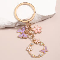 Llavero De Enamel Lindo Con Mariposa Y Flor De Sakura Llavero De Jardín Para Amigas Y Mujeres Regalo De Amistad Joyería Hecha a Mano - details 3