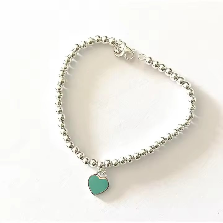 Hermosa y ligera pulsera de 18 cm con mini corazón turquesa de 1 cm, estilo corazon return love New York - 1
