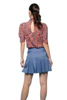Coronado Skirt - Falda Mini Plisada Minueto.La Coronado Skirt de Minueto es una falda mini que destaca por su diseño juvenil y detalles únicos. - details 1