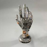 Figura de mano mecánica en resina , soporte para mandos de juego - details 7