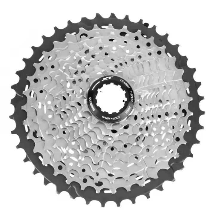 SHIMANO | Cassette DEORE XT M8000 11v - En combinación con una cadena premium de 11 velocidades con diseño asimétrico HG-X11 y tratamiento de la superficie SIL-TEC, el DEORE XT M8000 ofrece un - 1