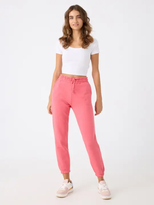 Pantalón jogger básico de felpa con bolsillos al bies y bajo con puños elásticos INSIDE - 1