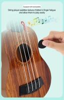 Ukelele De 35cm Para Niños Guitarra De Juguete Que Se Puede Usar Para Instrumentos Básicos Con Palillos Simulando Música De Guitarra - details 2