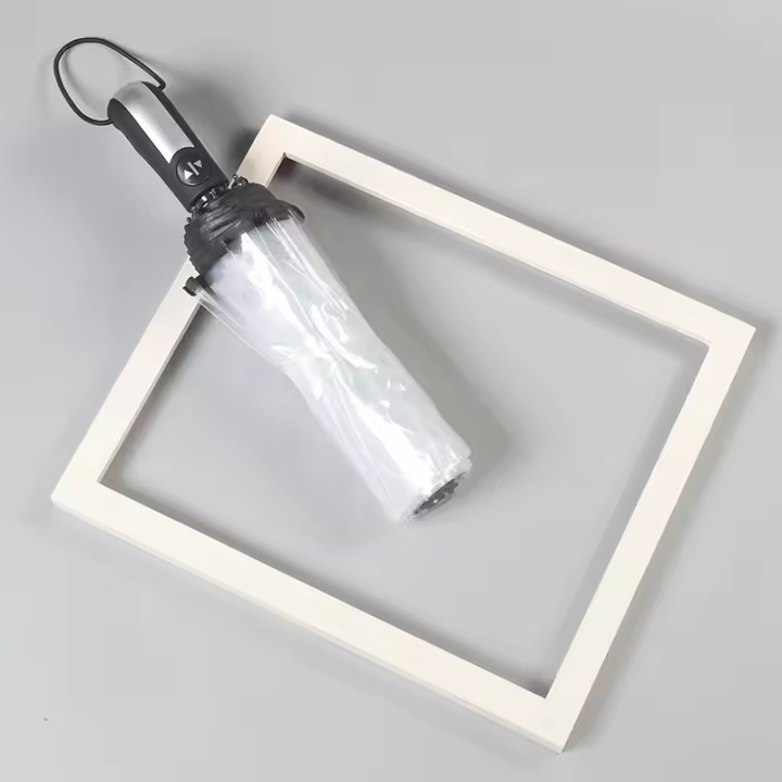 Paraguas plegable a prueba de viento para hombres y mujeres, apertura y cierre automático, compacto y resistente, paraguas plegable transparente, paraguas transparente de tres pliegues totalmente automático - 1